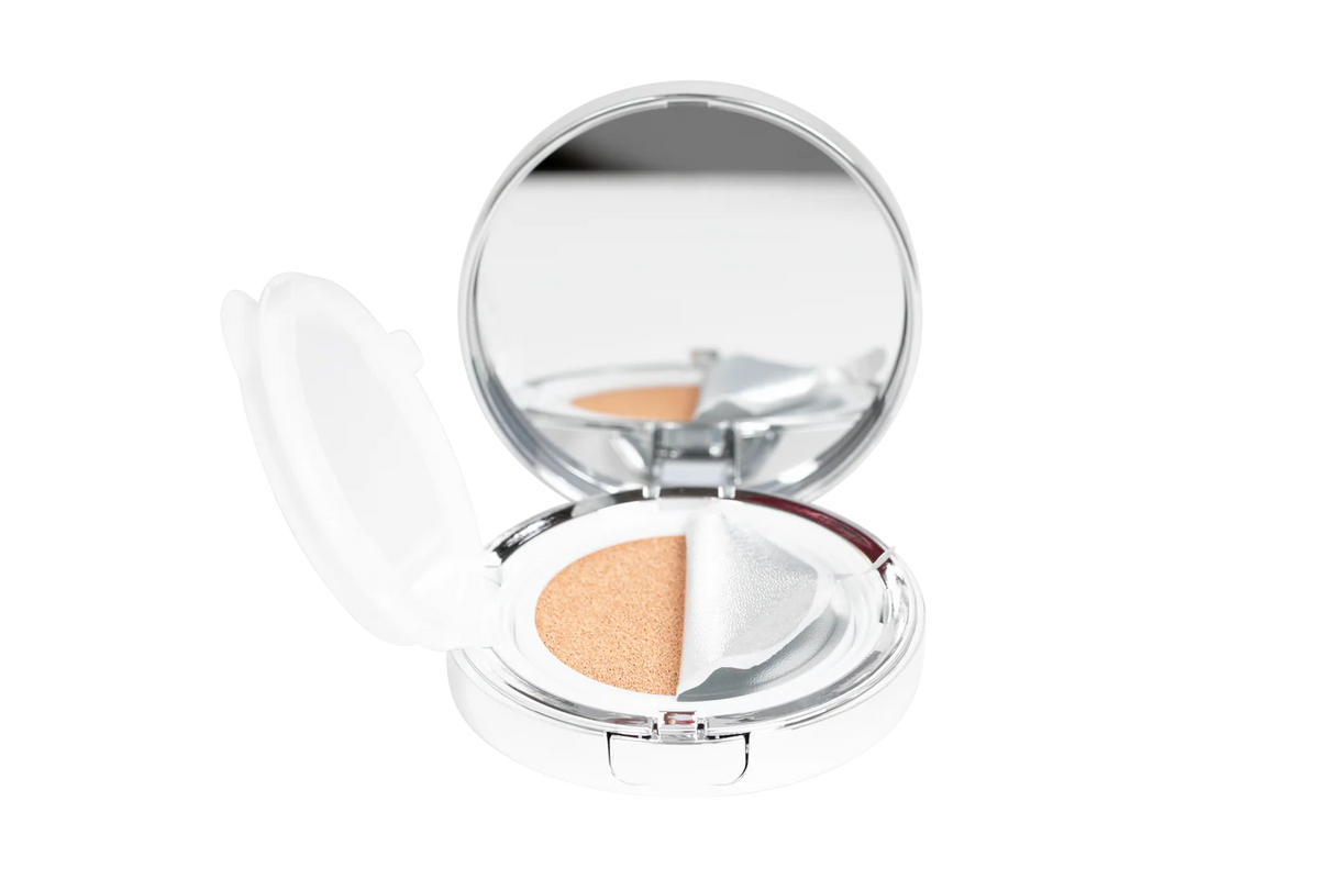 Compact powder with two shades in a clear case on a white background